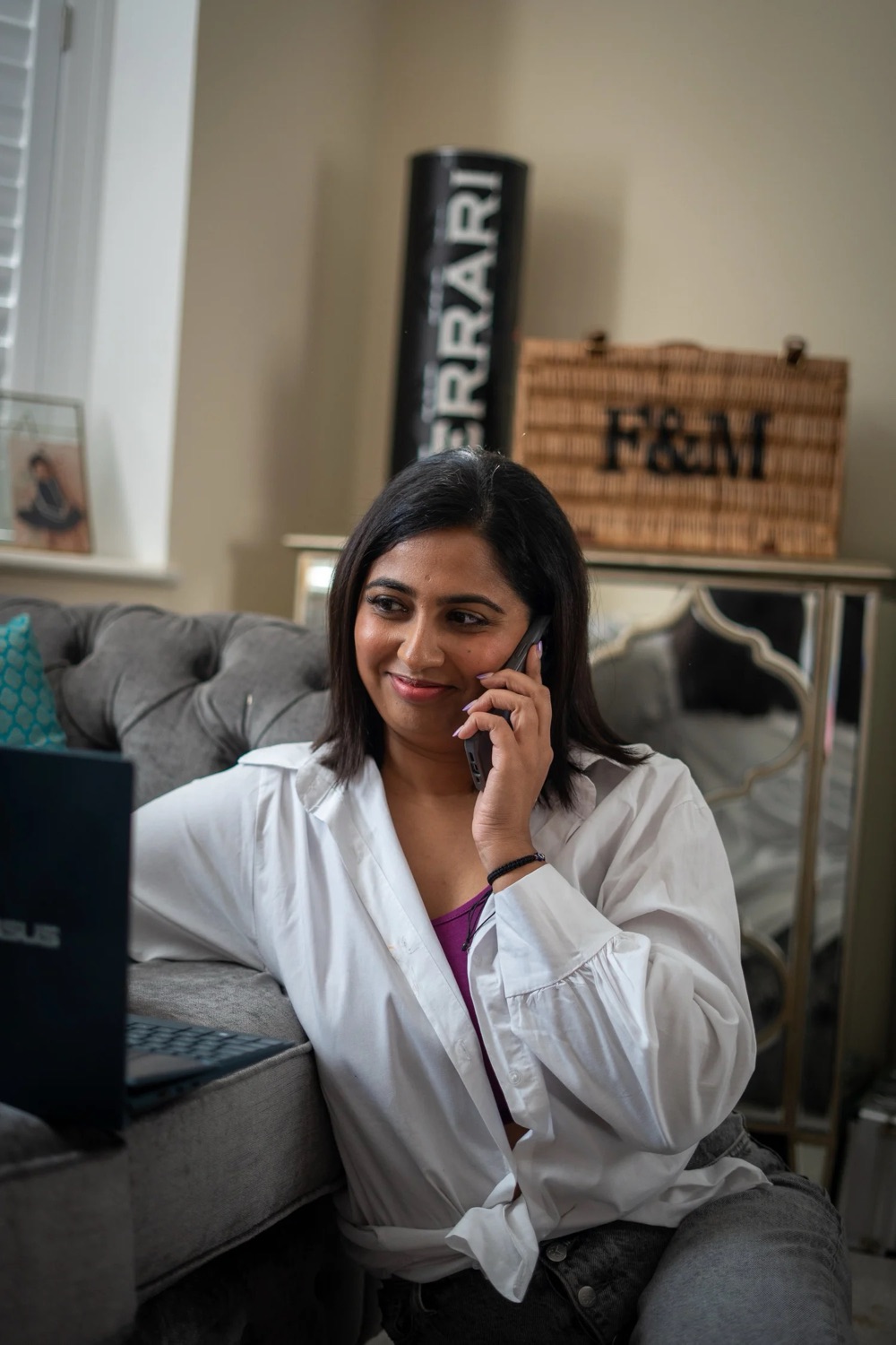 Jaz Dhaliwal on the phone