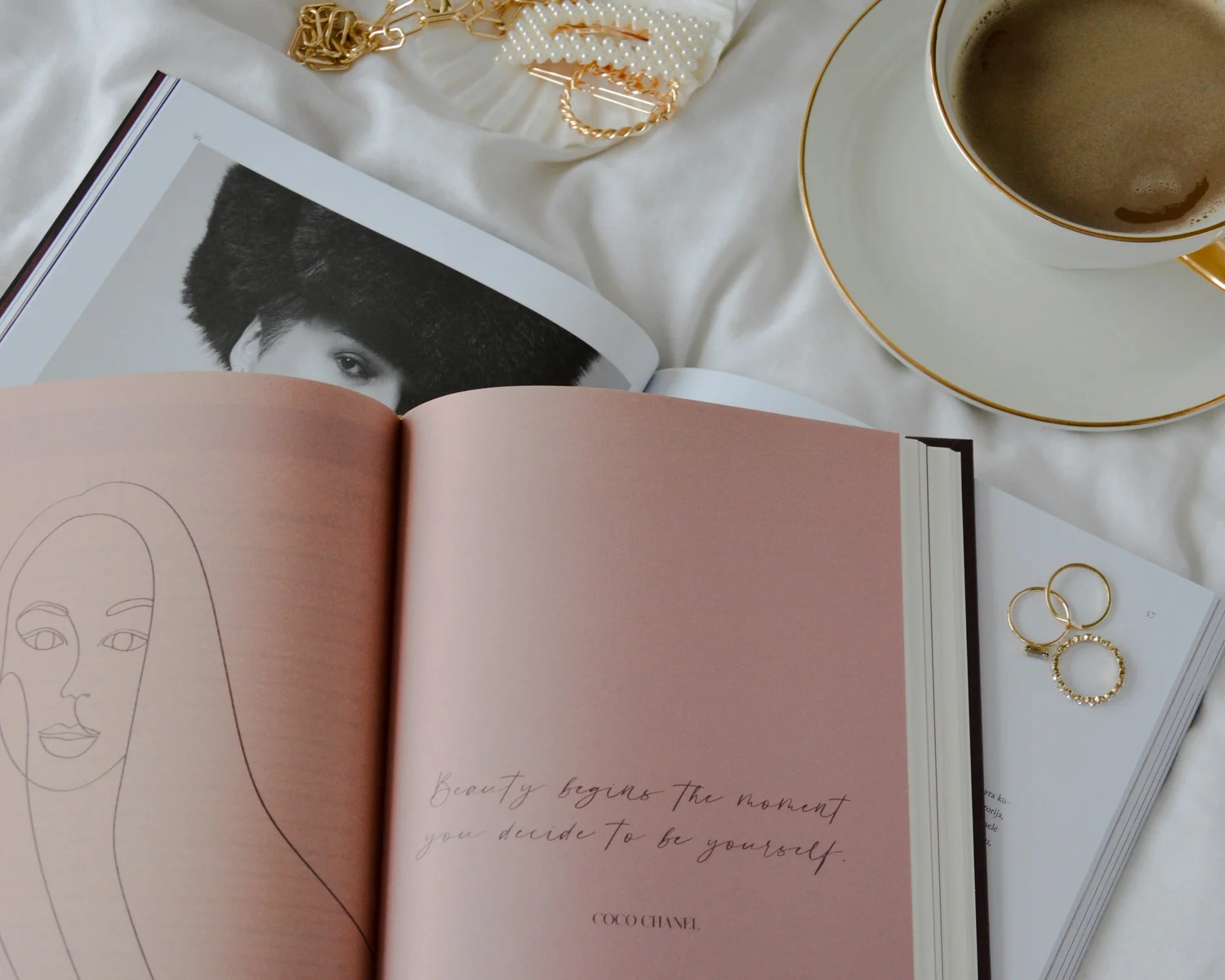 Open notebook with line-art illustration and rings